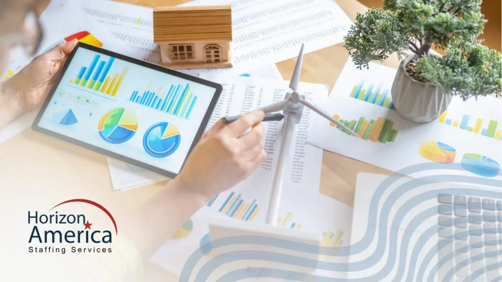 A desk covered with metrics illustrates workforce cost control