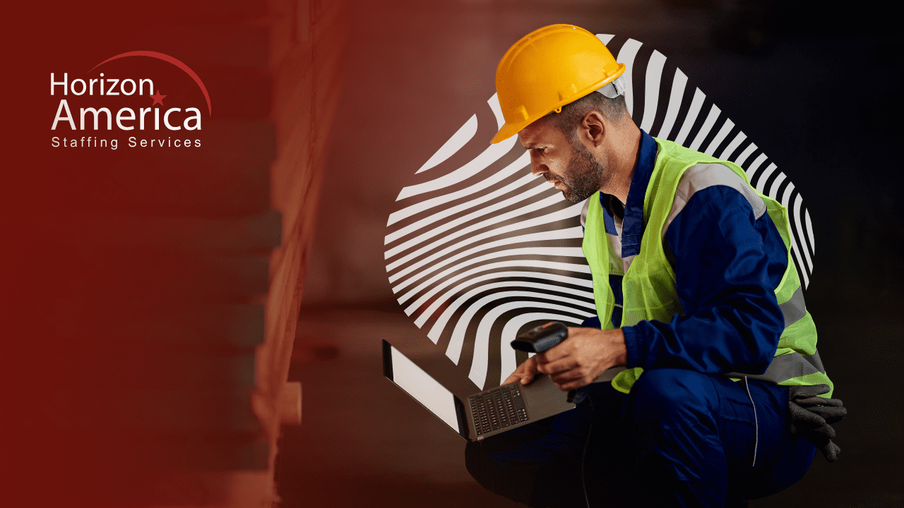 Man in safety vest and hard hat operating light industrial equipment